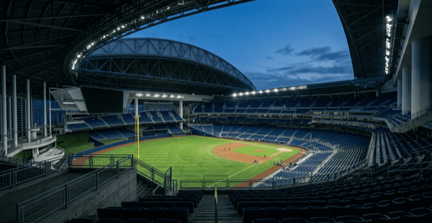 Interior of a modern domed baseball stadium at dusk, illustrating the Blue Jays trade deadline 2026 decision